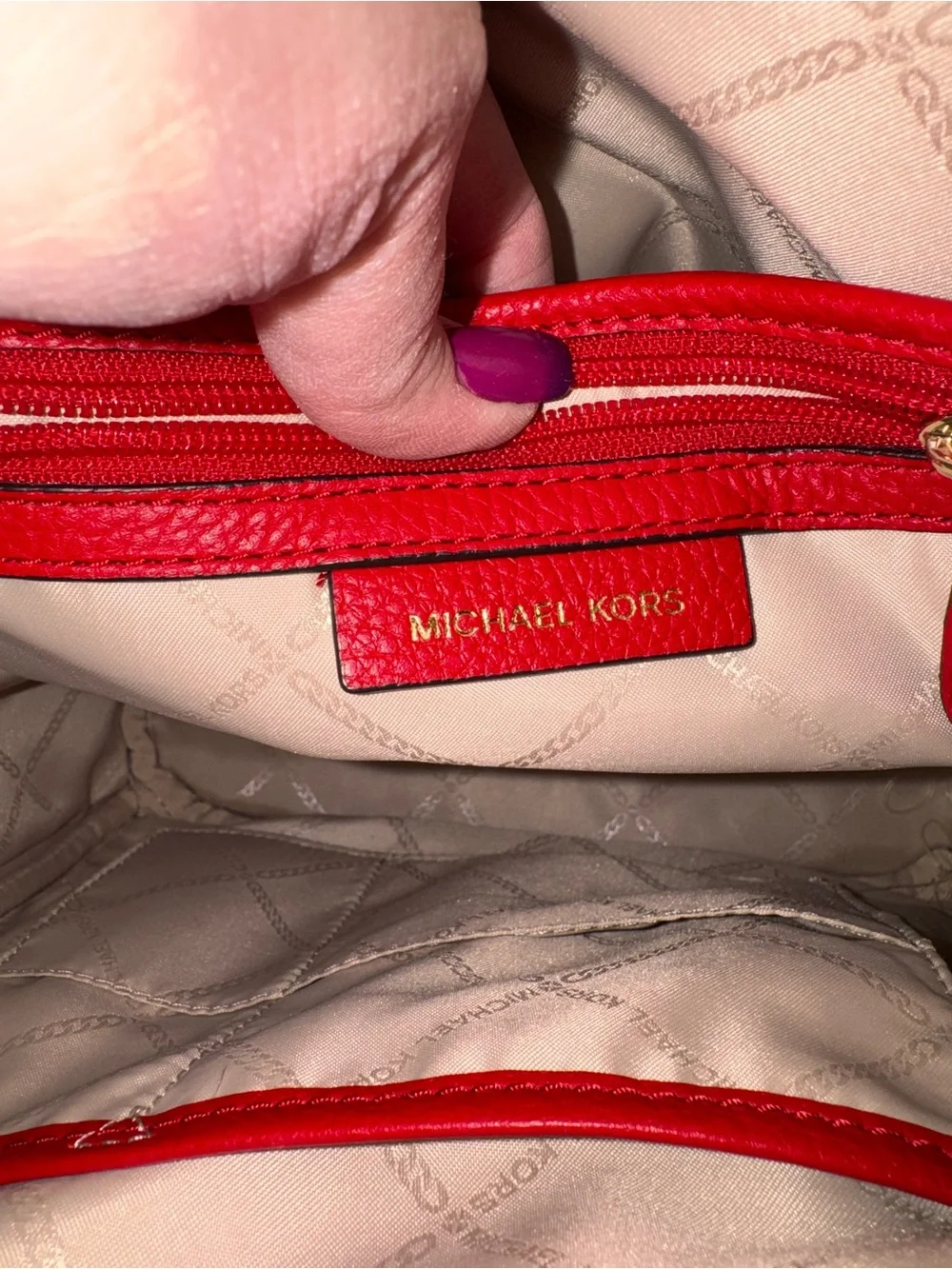 Michael Kors Brown Monogram Backpack with Red Trim and Gold Logo